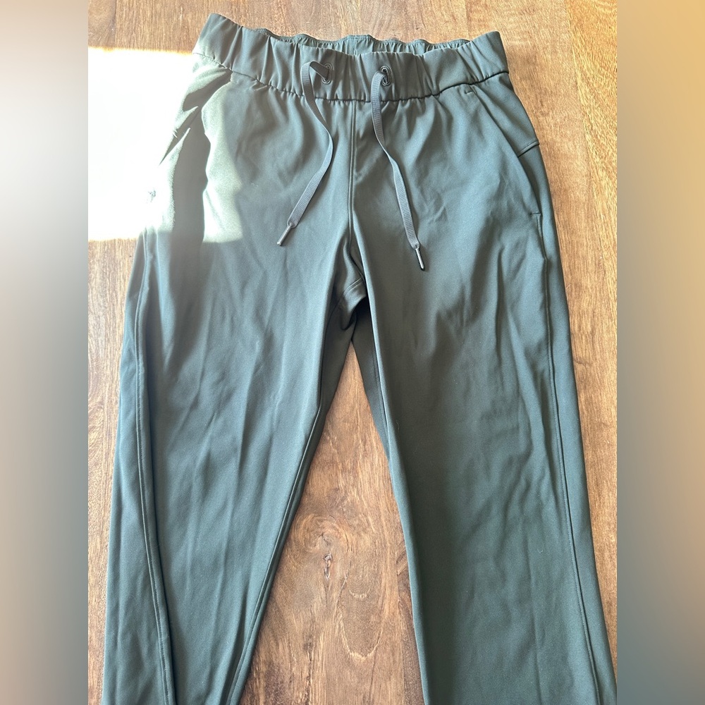 Lululemon On the Fly Pants Ankle Dark Olive Green Drawstring Womens Size 4